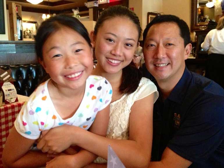 Santa Ono and his two daughters, Sarah and Juliana.
