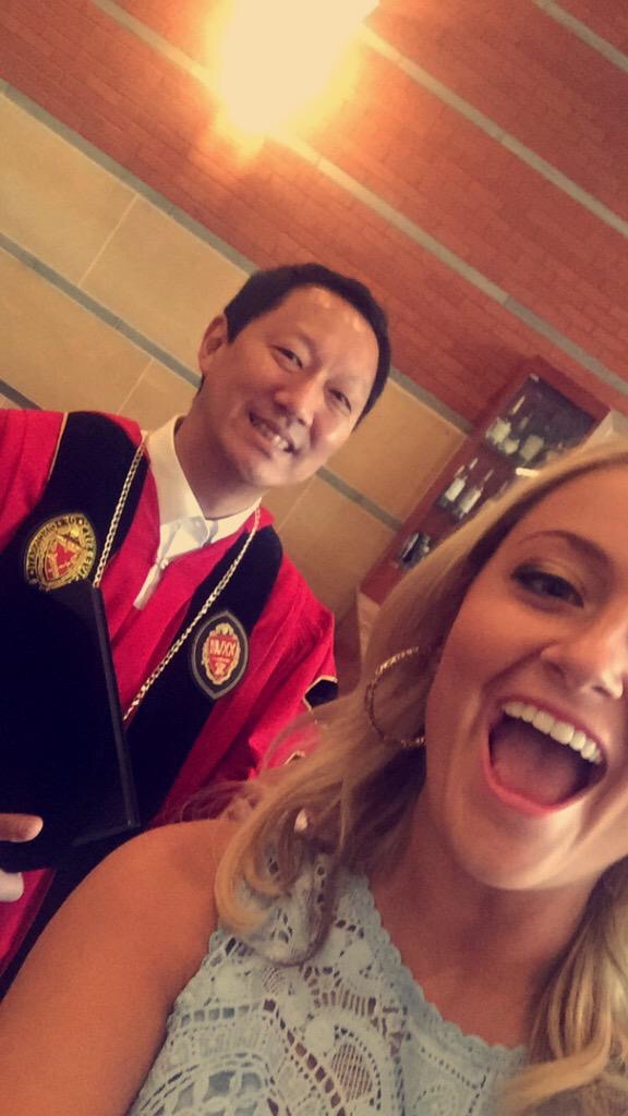Santa Ono pictured with a University of Cincinnati student in 2015.